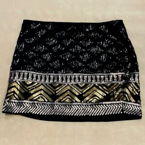 Express black/gold sequined mini skirt. Size small